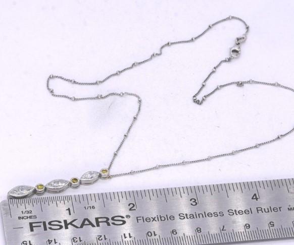Vintage Platinum 1.65CT White & Fancy Intense Yellow diamond pendant necklace