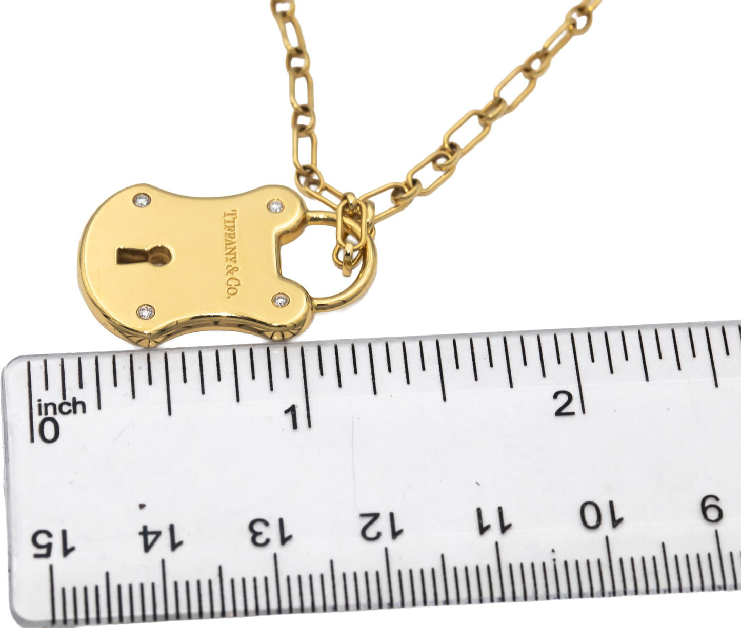 TIFFANY & CO. 18k Yellow Gold Round VS Diamond Padlock Pendant Necklace 0.06CT