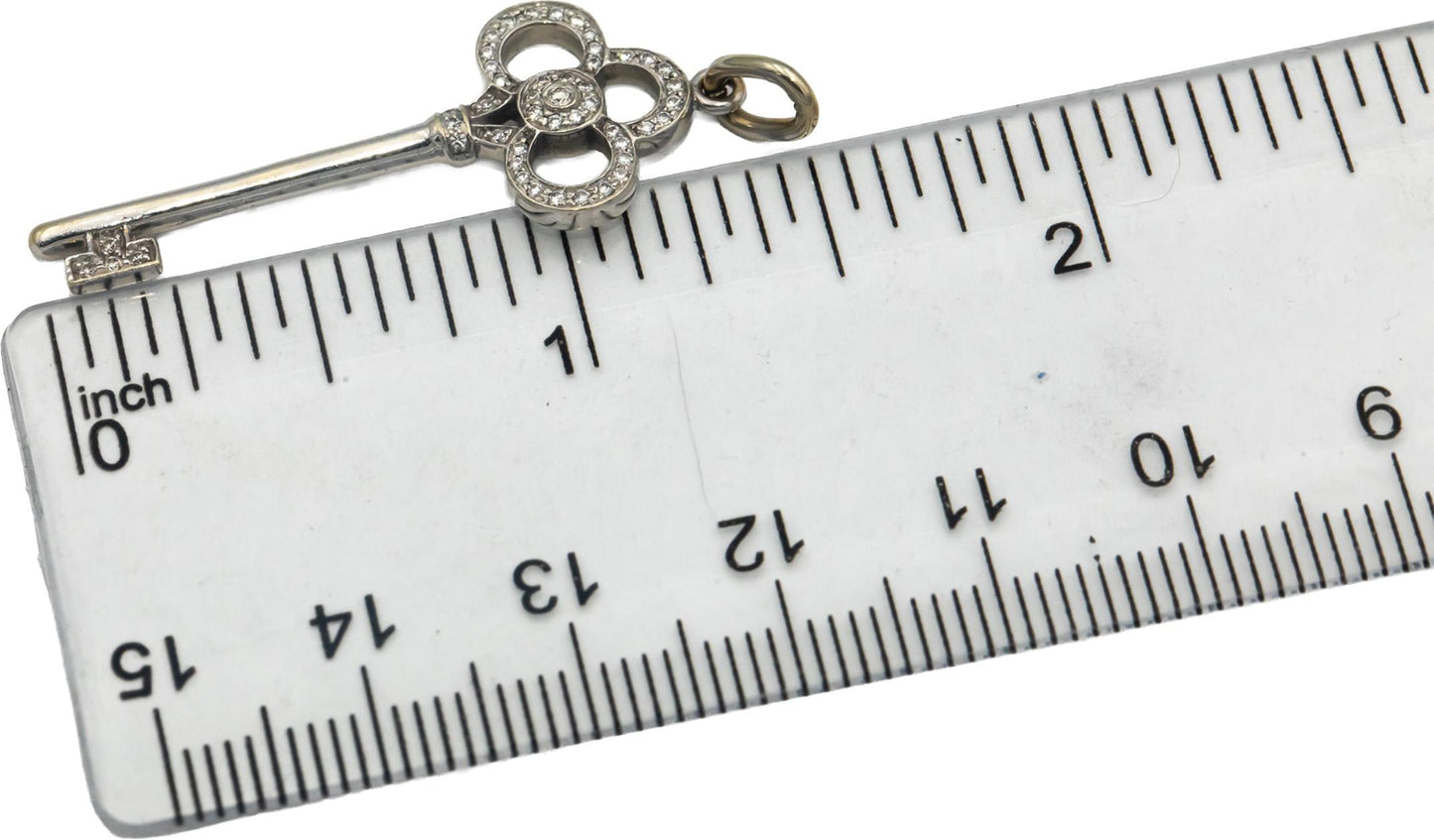 TIFFANY & CO. 18k White Gold Round Diamond Crown Key Pendant 0.11CT w/ Pouch