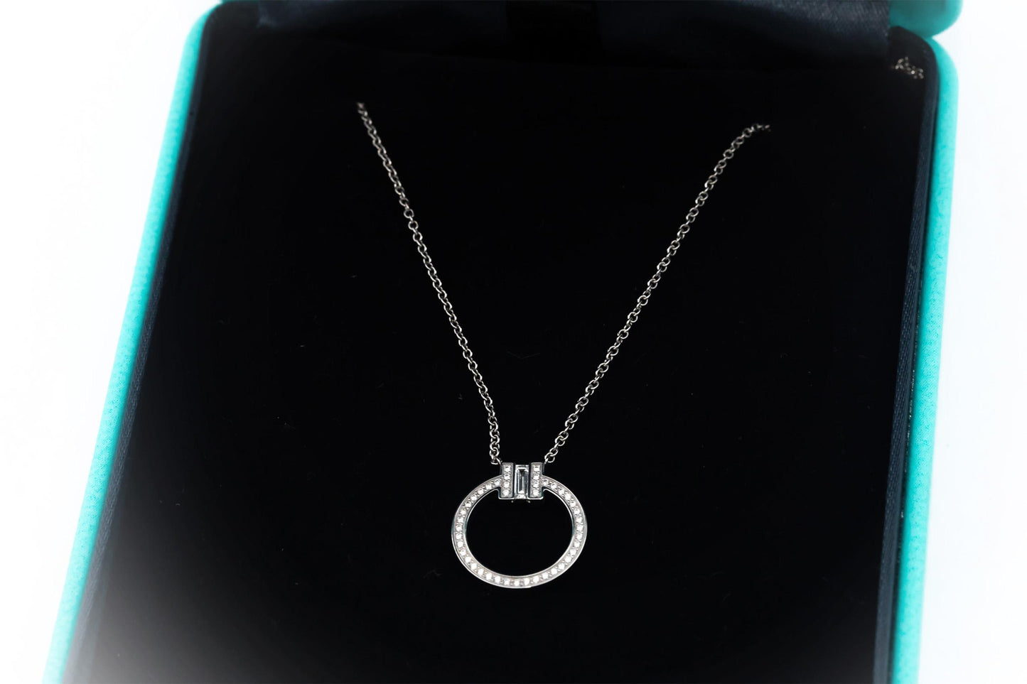 TIFFANY & CO. 18k White Gold 0.15CT Diamond T Circle Pendant Necklace $4800