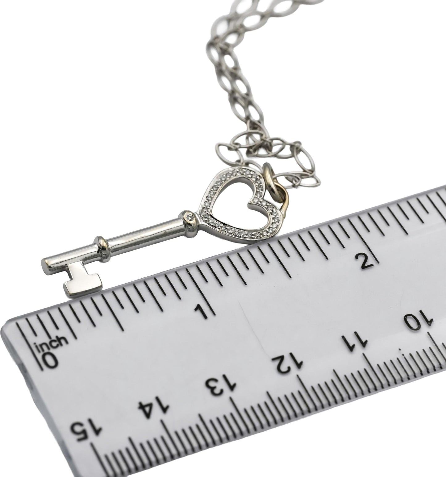 TIFFANY & CO. 18k White Gold Round Diamond Heart Key Pendant Necklace 0.13CT