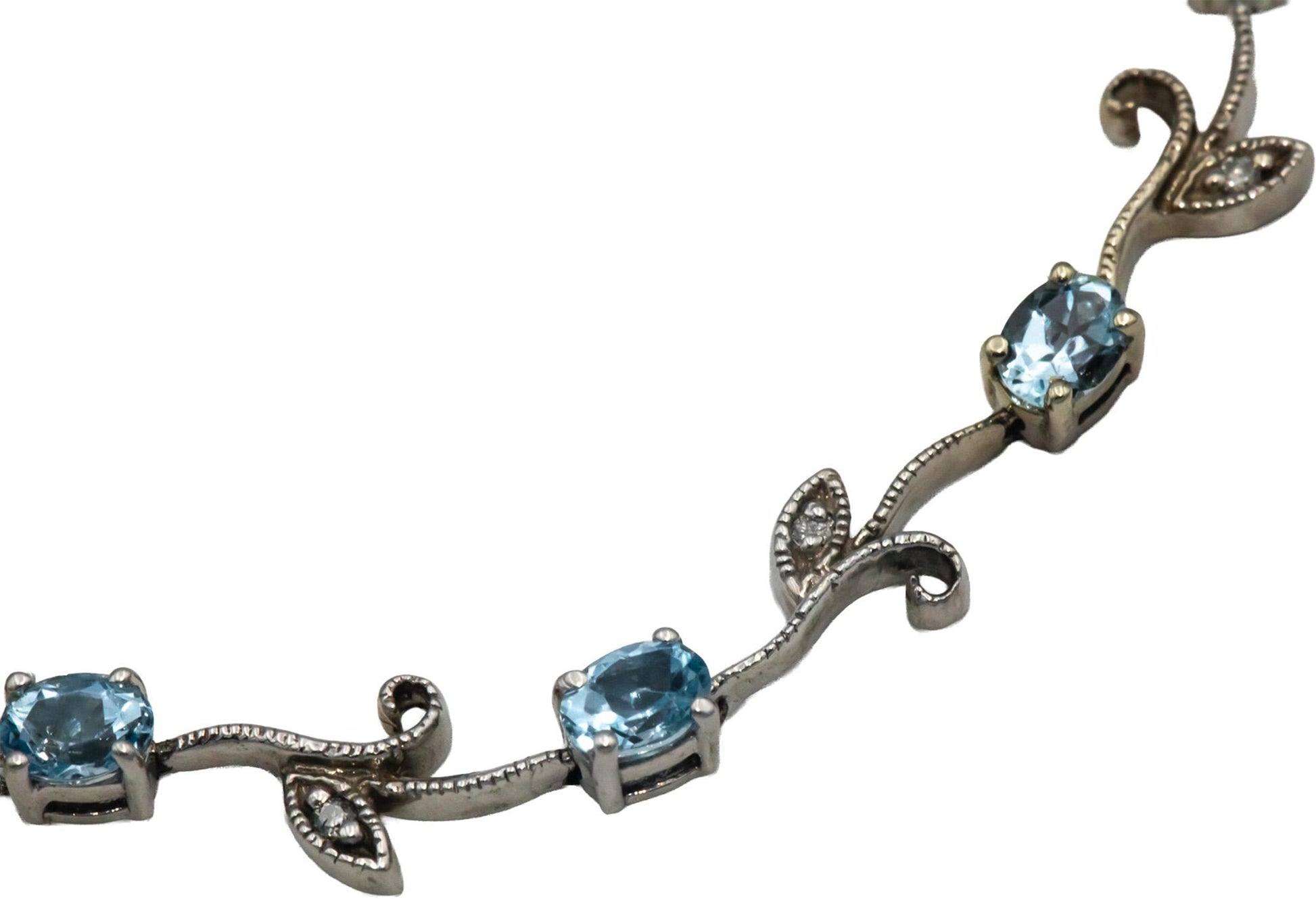14k White Gold 1.56CT Diamond and Aquamarine Floral Link Bracelet