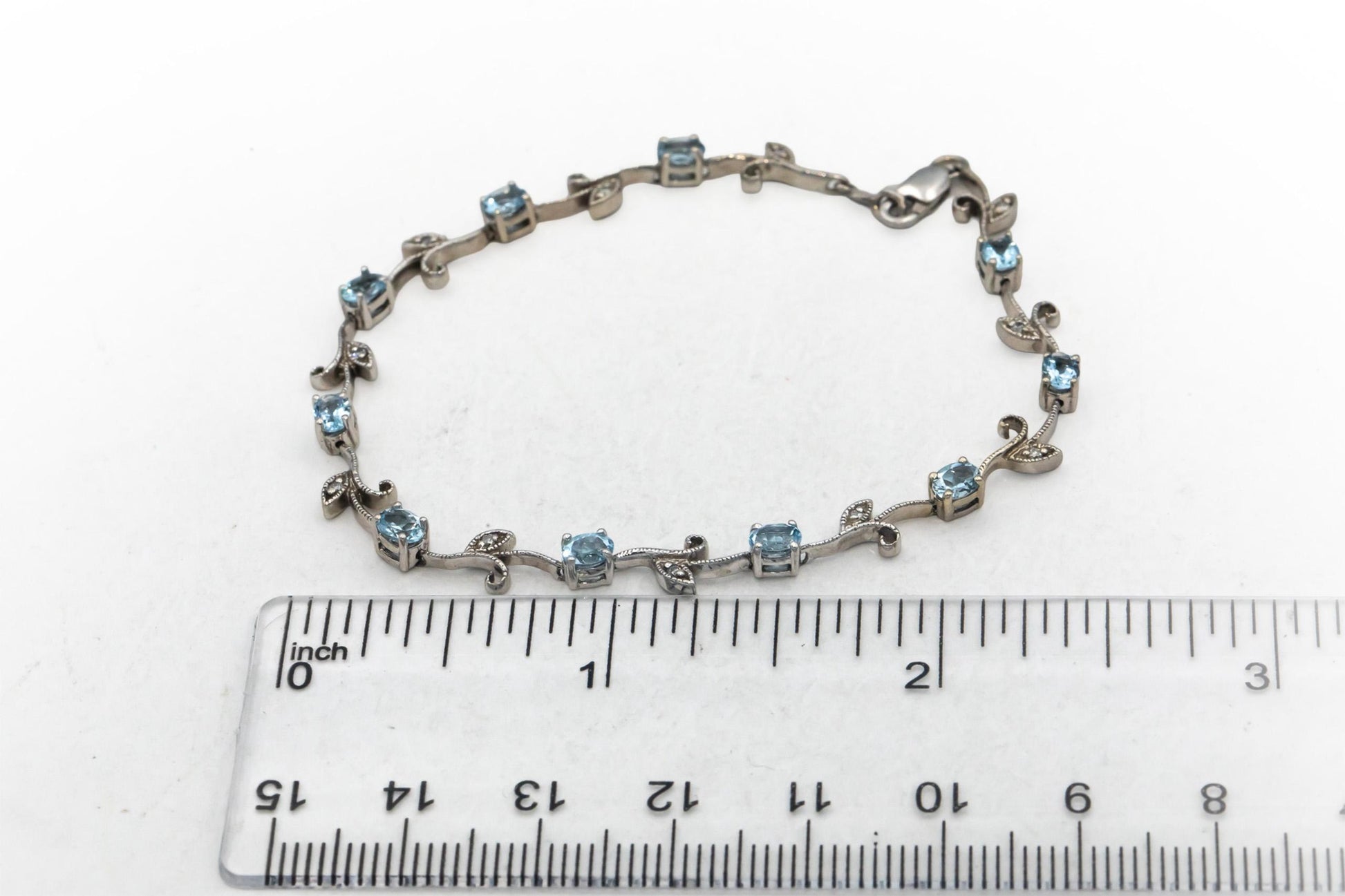 14k White Gold 1.56CT Diamond and Aquamarine Floral Link Bracelet