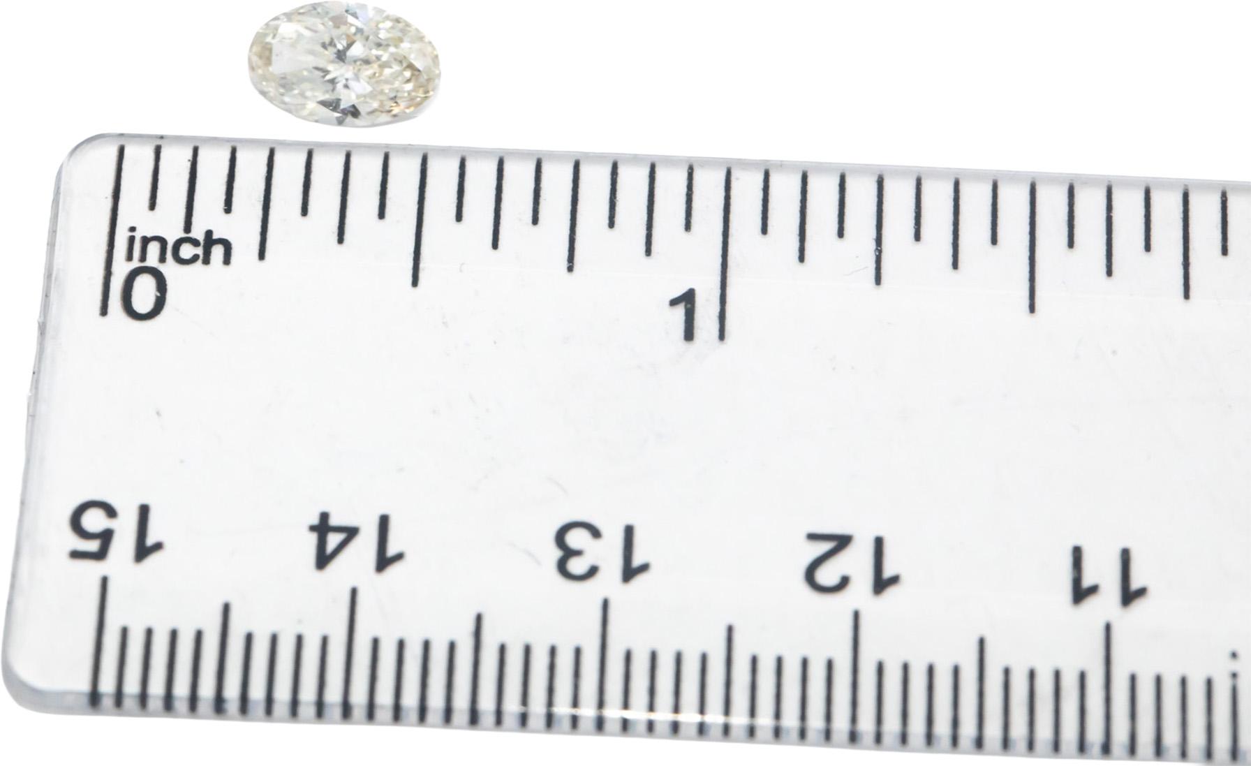 GIA Certified 1.00CT SI2/K,Faint Brown Oval Cut Loose Diamond