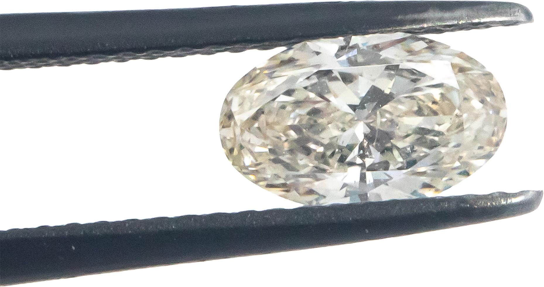 GIA Certified 1.00CT SI2/K,Faint Brown Oval Cut Loose Diamond