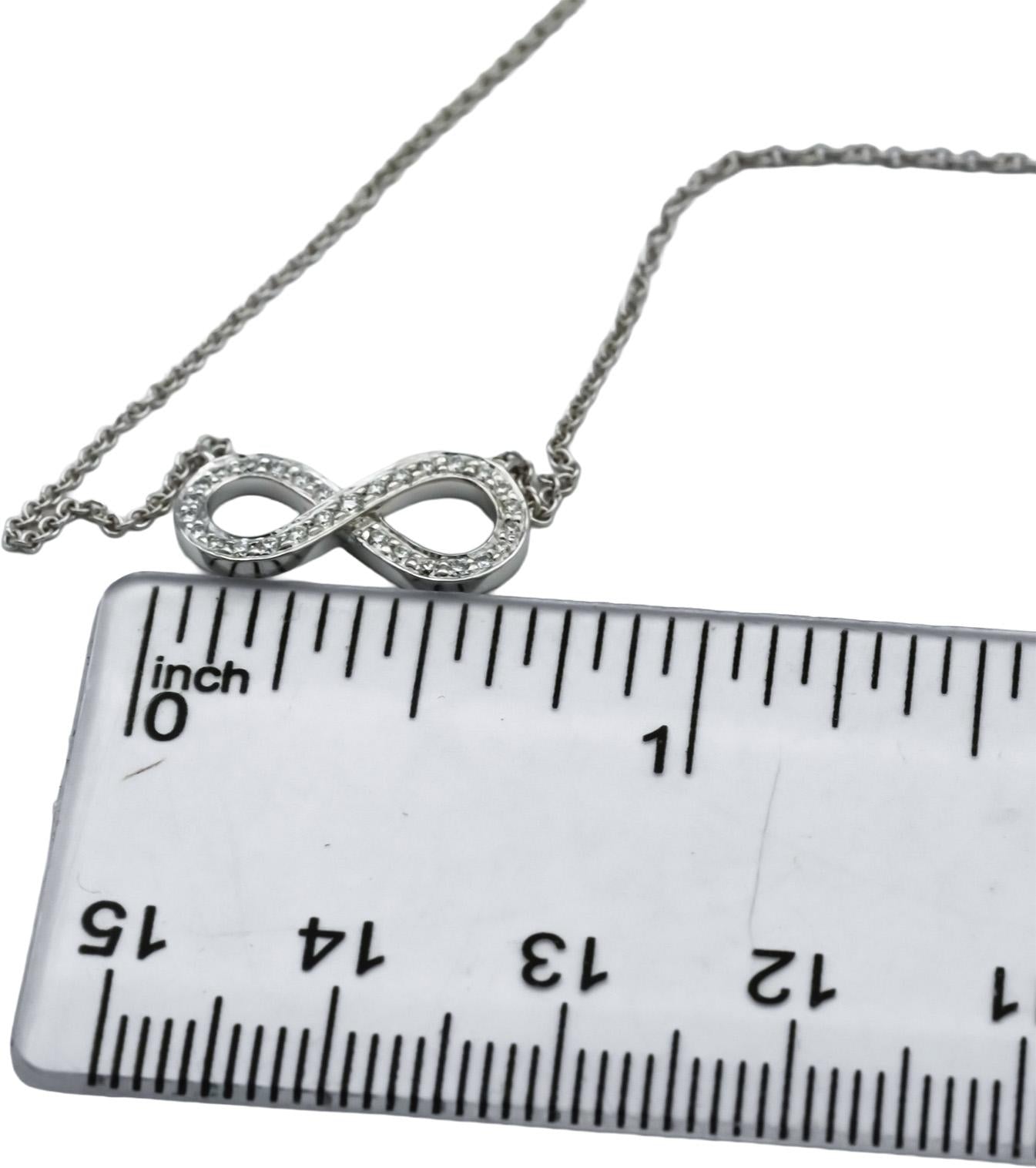 TIFFANY & CO. Platinum Round VS Diamond Infinity Pendant Necklace 0.15CT