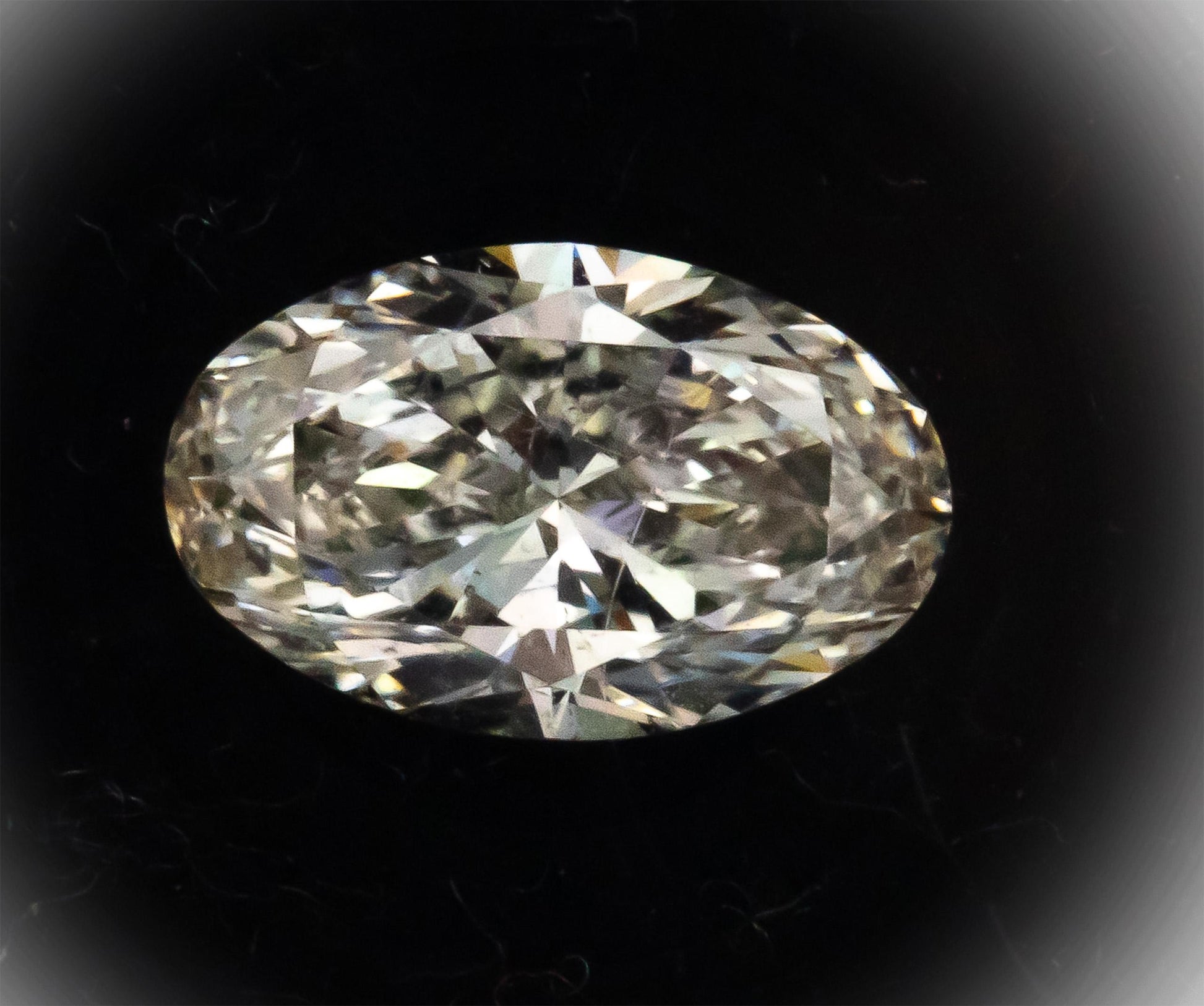 GIA Certified 1.00CT SI2/K,Faint Brown Oval Cut Loose Diamond