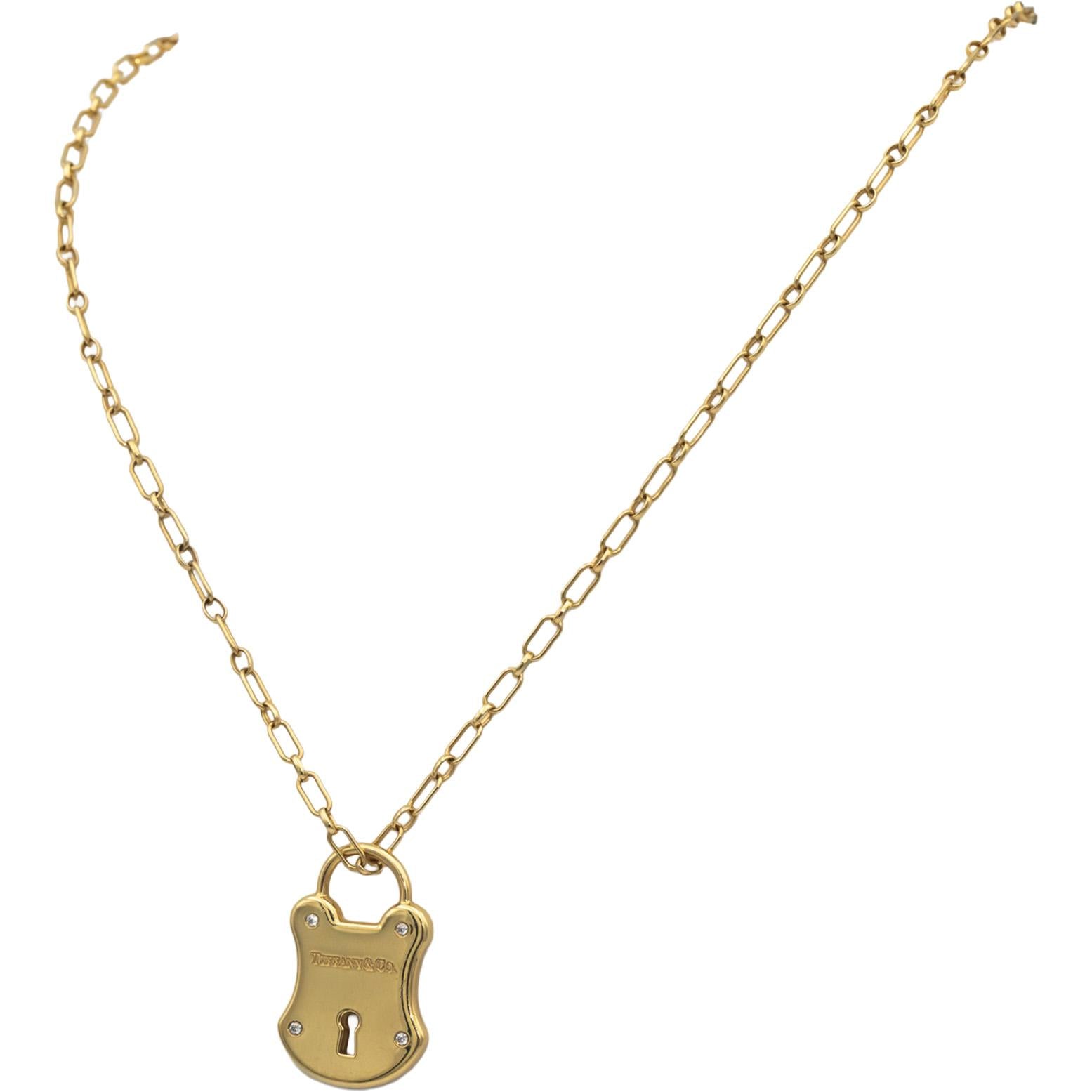 TIFFANY & CO. 18k Yellow Gold Round VS Diamond Padlock Pendant Necklace 0.06CT