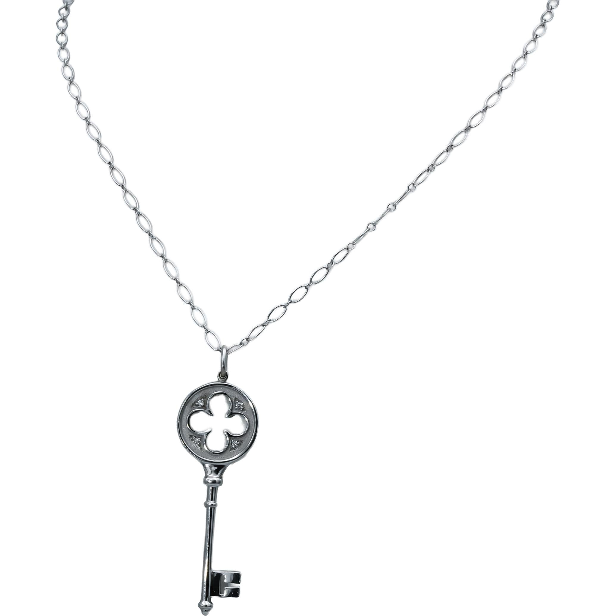 TIFFANY & CO. 18k White Gold Clover Key Pendant Necklace w/ Diamond Accents