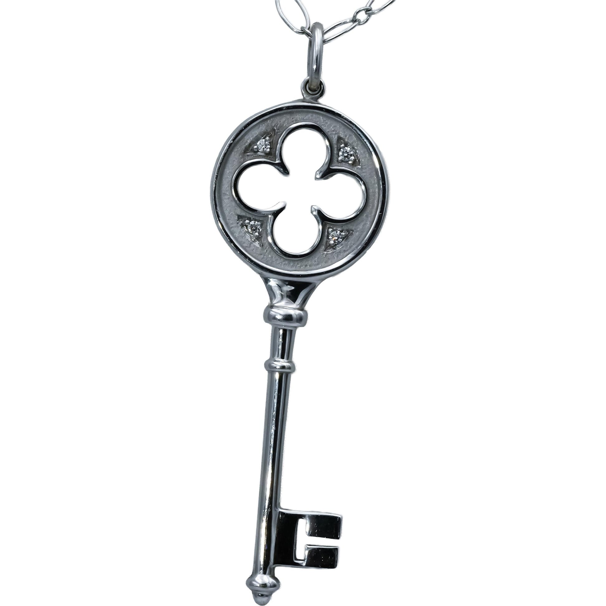TIFFANY & CO. 18k White Gold Clover Key Pendant Necklace w/ Diamond Accents