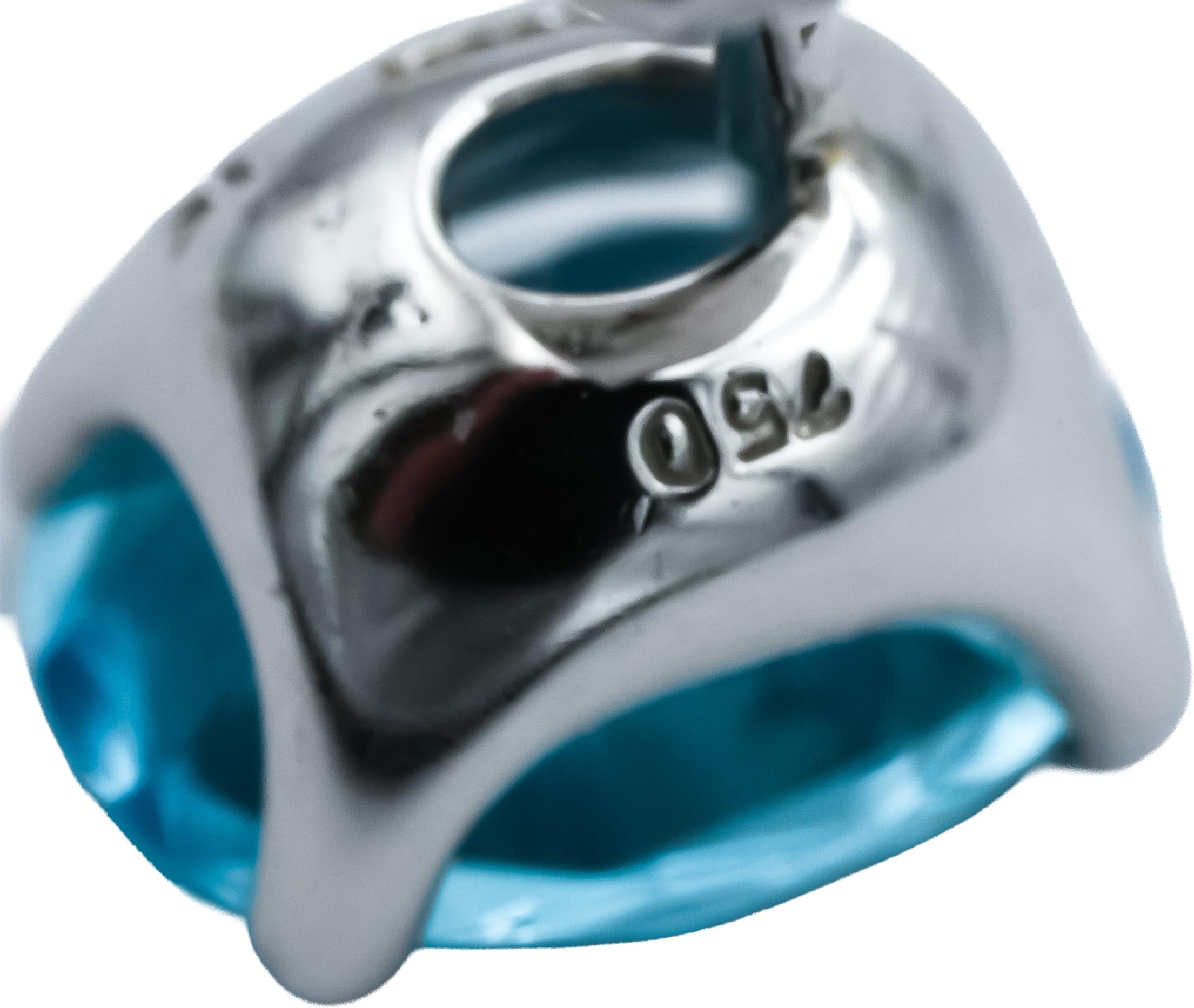18k White Gold Oval Cut Blue Topaz Stud Earrings