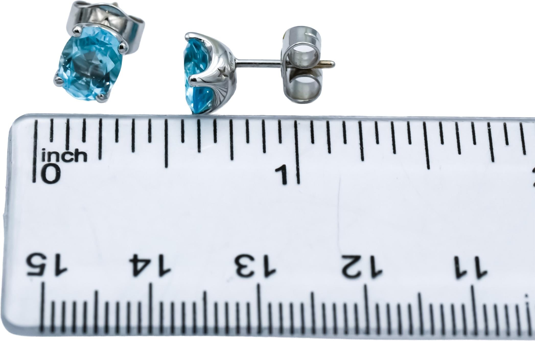 18k White Gold Oval Cut Blue Topaz Stud Earrings
