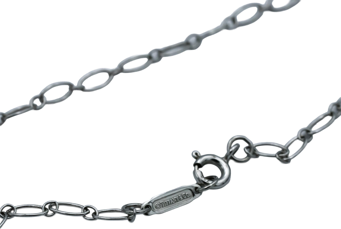 TIFFANY & CO. 18k White Gold Clover Key Pendant Necklace w/ Diamond Accents