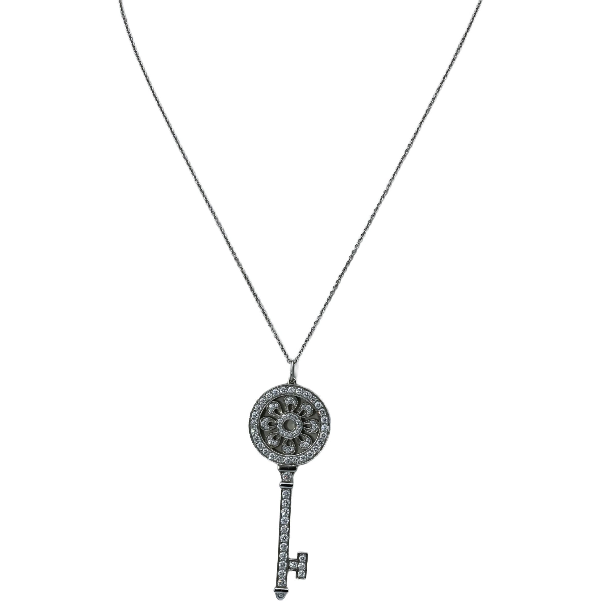 TIFFANY & CO. Platinum and 18k Gold Diamond Petals Key Pendant Necklace 1.18CT