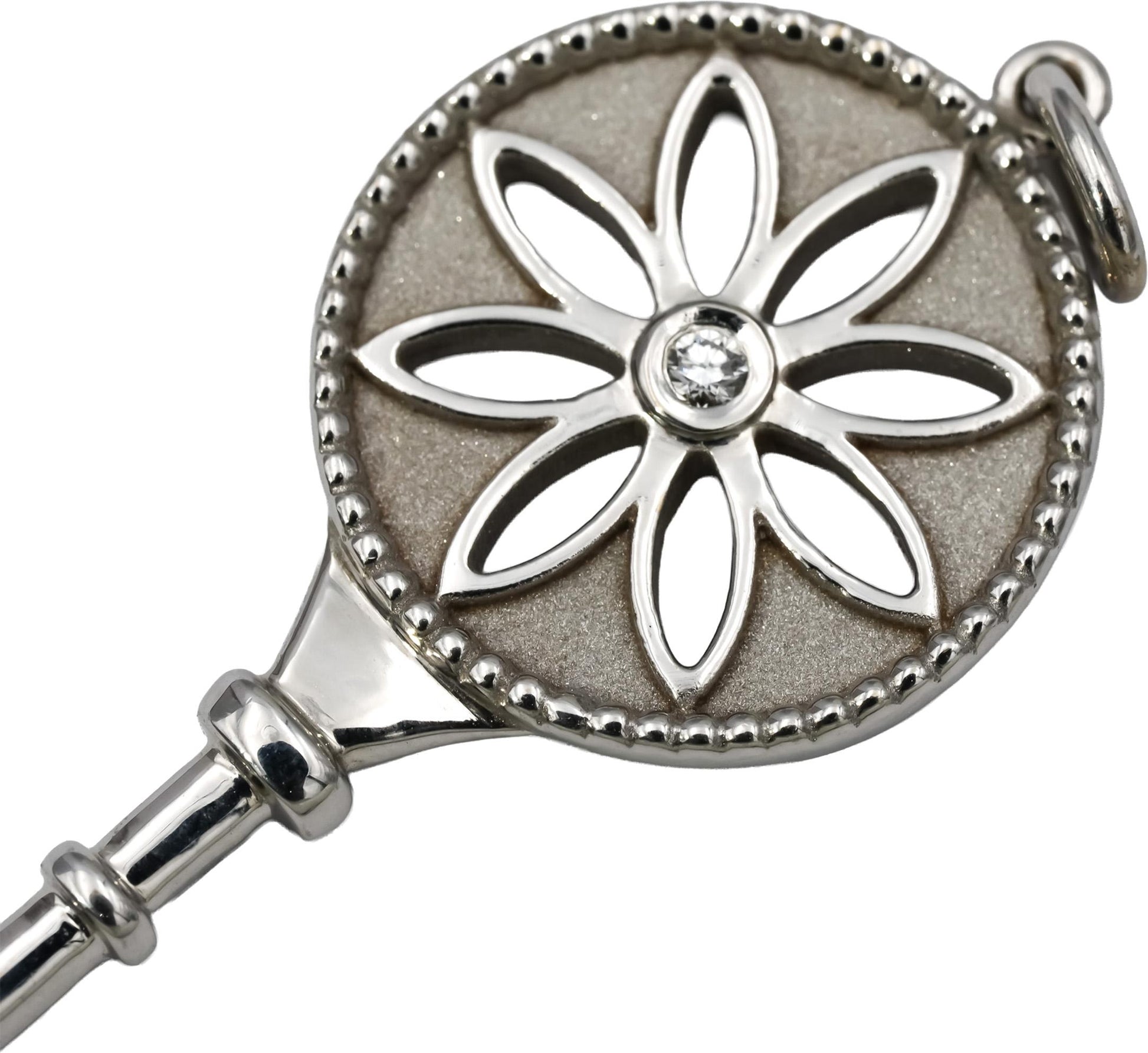 TIFFANY & CO. 18k White Gold VS Diamond Large Daisy Key Pendant 0.05CT
