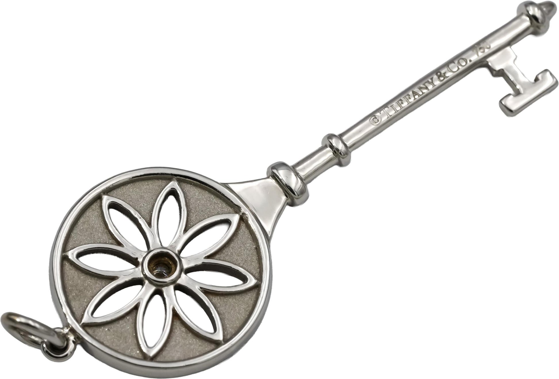 TIFFANY & CO. 18k White Gold VS Diamond Large Daisy Key Pendant 0.05CT