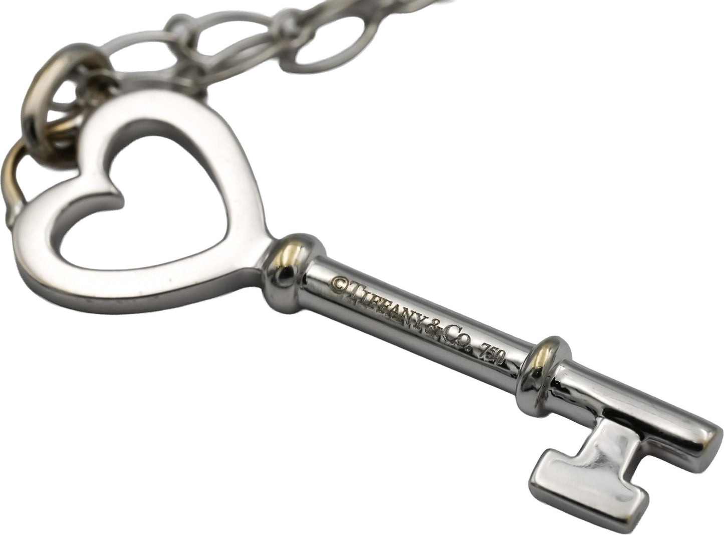 TIFFANY & CO. 18k White Gold Round Diamond Heart Key Pendant Necklace 0.13CT