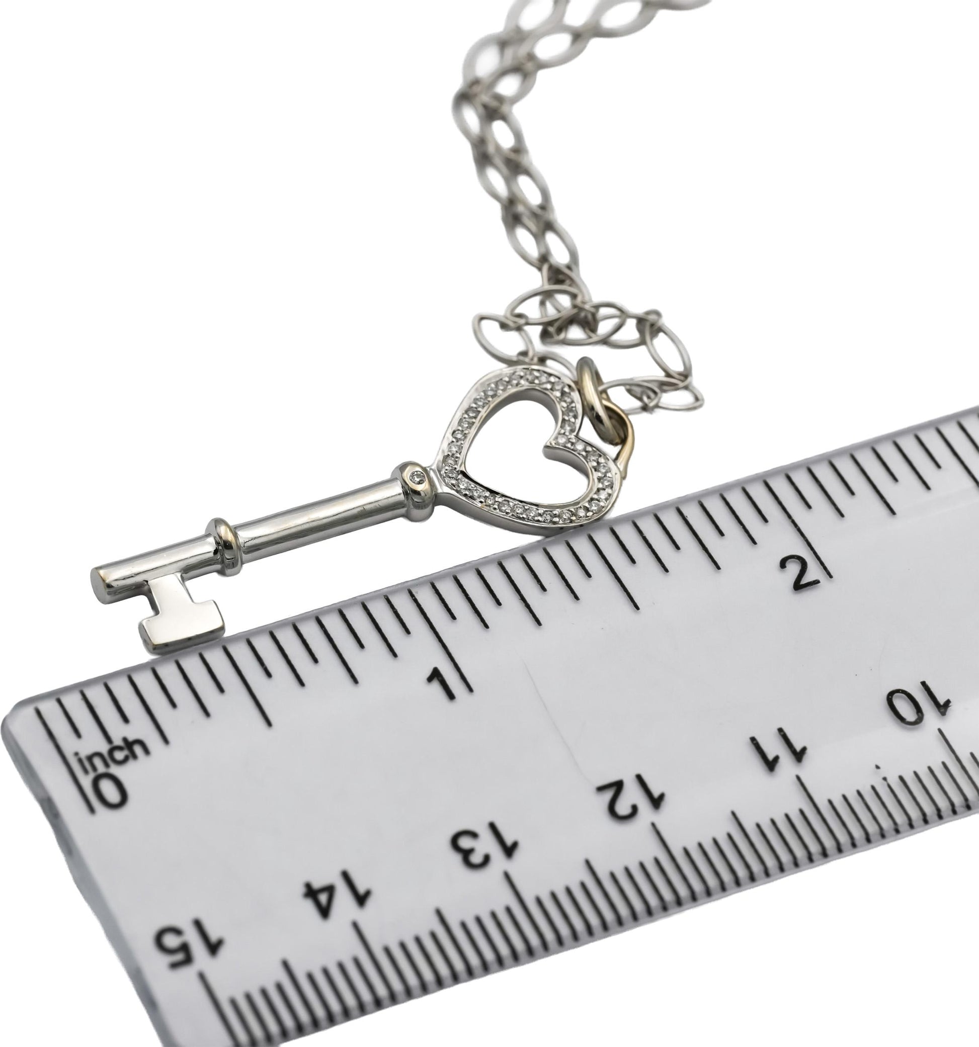 TIFFANY & CO. 18k White Gold Round Diamond Heart Key Pendant Necklace 0.13CT