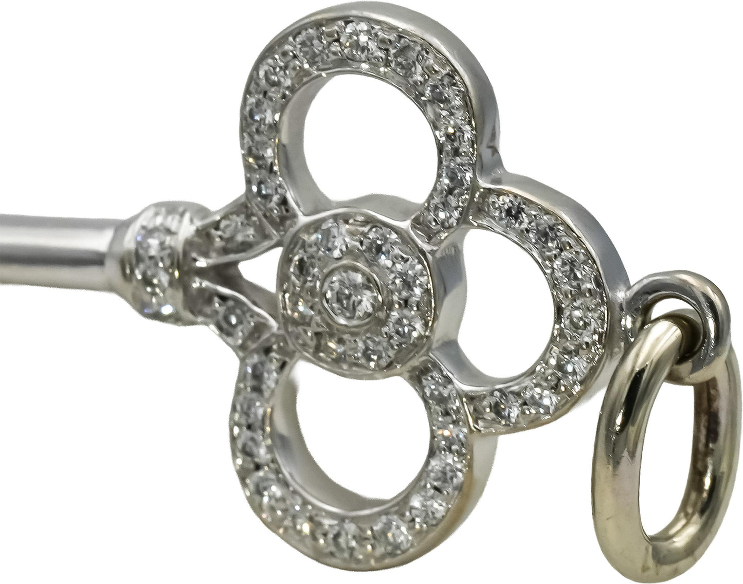 TIFFANY & CO. 18k White Gold VS Round Diamond Key Pendant 0.11CT