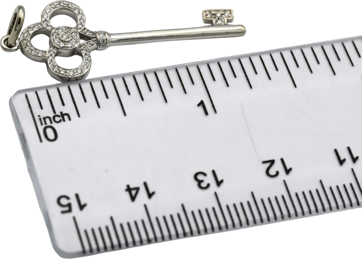 TIFFANY & CO. 18k White Gold VS Round Diamond Key Pendant 0.11CT