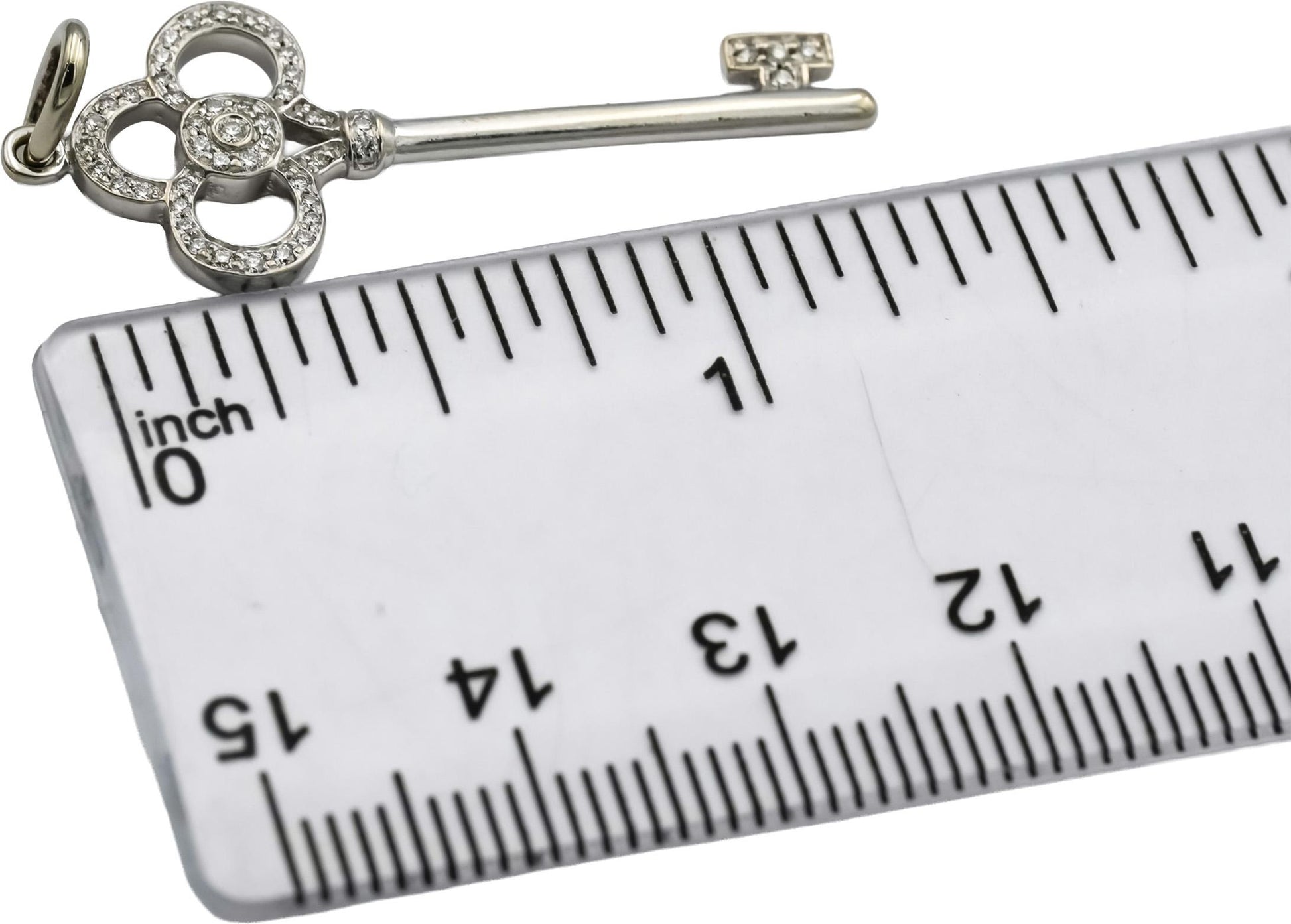 TIFFANY & CO. 18k White Gold VS Round Diamond Key Pendant 0.11CT