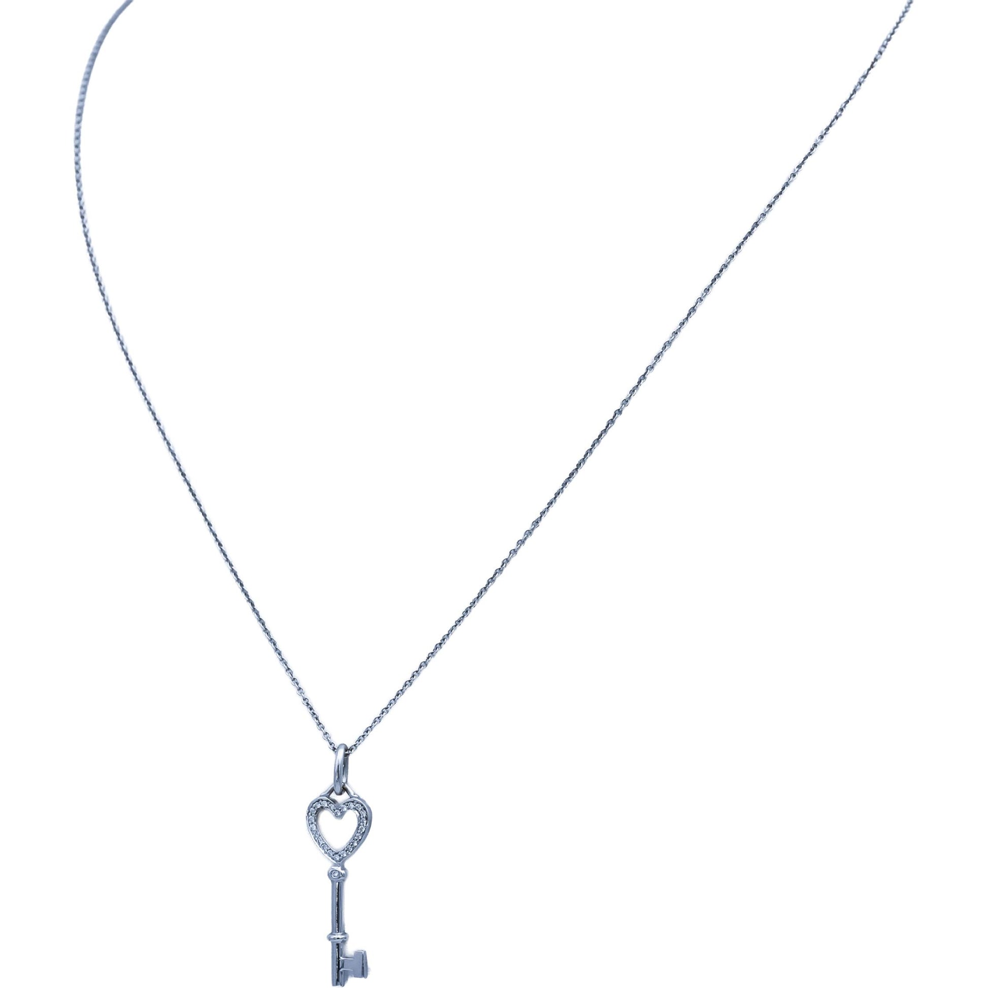 TIFFANY & CO. 18k White Gold VS Round Diamond Heart Key Pendant Necklace 0.12CT