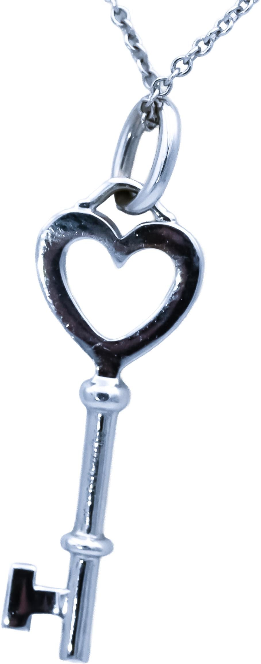 TIFFANY & CO. 18k White Gold VS Round Diamond Heart Key Pendant Necklace 0.12CT