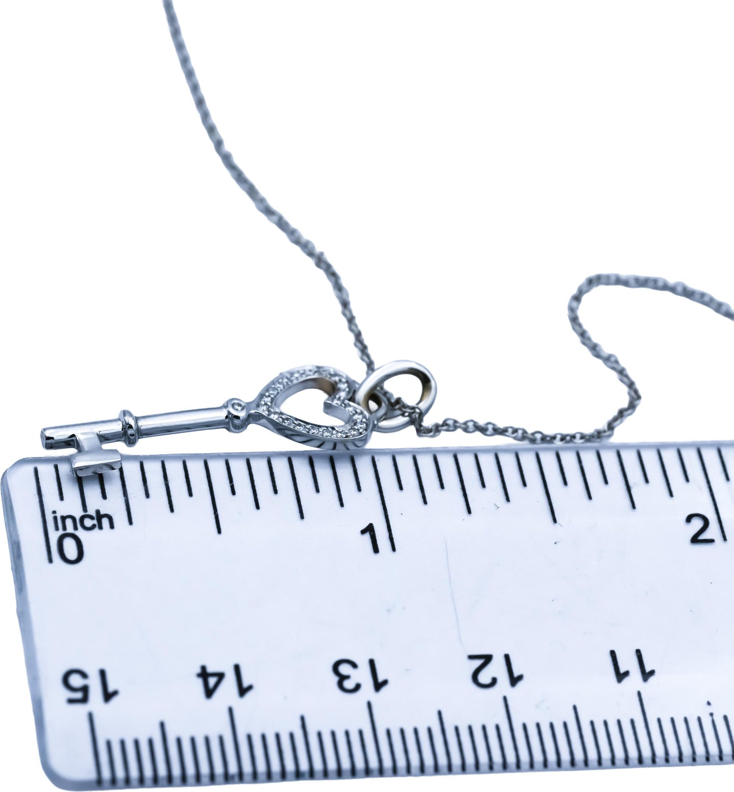 TIFFANY & CO. 18k White Gold VS Round Diamond Heart Key Pendant Necklace 0.12CT